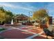 Image depicts a charming community square with fountain, benches, and landscaping at 3315 Stillwood Ln, Atlanta, GA 30354
