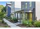 Townhome exterior with yellow door and landscaped walkway at 3315 Stillwood Ln, Atlanta, GA 30354