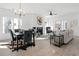 Open living space with fireplace, dining area, and ample natural light at 3315 Stillwood Ln, Atlanta, GA 30354