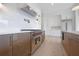 Modern kitchen featuring stainless steel appliances, a stylish range hood, and elegant cabinetry at 8200 Main St # 1206, Woodstock, GA 30188
