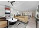 Spacious living room with a fireplace, open floor plan, and modern decor at 8200 Main St # 1206, Woodstock, GA 30188