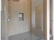 Modern shower with glass enclosure and gray tiling at 8200 Main St # 1206, Woodstock, GA 30188