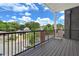 Balcony overlooking the neighborhood with black metal railings at 8200 Main S St # 1208, Woodstock, GA 30188