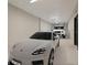 Well-lit garage featuring modern vehicles, offering secure parking at 8200 Main S St # 1208, Woodstock, GA 30188