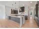 Contemporary kitchen features sleek cabinets and a stylish waterfall island at 8200 Main S St # 1208, Woodstock, GA 30188