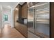 Gourmet kitchen featuring stainless steel appliances and custom cabinets at 8200 Main S St # 1208, Woodstock, GA 30188