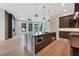 Large kitchen with an island and lots of natural light at 8200 Main S St # 1208, Woodstock, GA 30188