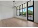 Bright living space with large windows, a private terrace, and hardwood floors at 8200 Main S St # 1208, Woodstock, GA 30188