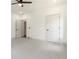 Large bedroom featuring plush gray carpet, and a ceiling fan at 2884 Thompson Cir, Decatur, GA 30034