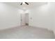 Light and bright bedroom featuring carpet flooring, white walls, and modern ceiling fan at 2884 Thompson Cir, Decatur, GA 30034