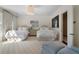 Bedroom featuring two beds, soft lighting, and serene decor at 3560 Ridgewood Nw Rd, Atlanta, GA 30327