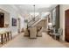 Dining area with view of staircase, chandelier, and dining table set for six at 3560 Ridgewood Nw Rd, Atlanta, GA 30327