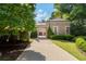 Beautiful driveway leading to a brick home with manicured landscaping at 3560 Ridgewood Nw Rd, Atlanta, GA 30327