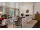 Bright living room with a fireplace, grand piano, and stylish furnishings at 3560 Ridgewood Nw Rd, Atlanta, GA 30327