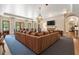 Large living room with fireplace, ample seating, and hardwood floors at 3560 Ridgewood Nw Rd, Atlanta, GA 30327