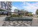 Serene amenity area with water feature, landscaping, and comfortable seating areas, offering a relaxing outdoor space at 3107 Peachtree Ne Rd # 1101, Atlanta, GA 30305
