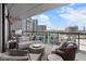 Relaxing condo balcony featuring comfortable seating, an outdoor grill, and panoramic city views at 3107 Peachtree Ne Rd # 1101, Atlanta, GA 30305