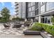 Relaxing outdoor lounge with comfortable seating, lush landscaping, and modern design, perfect for residents at 3107 Peachtree Ne Rd # 1101, Atlanta, GA 30305