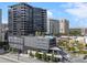 High-rise condominium with an elevated pool deck featuring panoramic city views and modern architecture at 3107 Peachtree Ne Rd # 1101, Atlanta, GA 30305