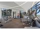 Bright, modern gym with state-of-the-art equipment and large windows offering great views at 3107 Peachtree Ne Rd # 1101, Atlanta, GA 30305