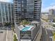 Rooftop pool and sundeck with lounge chairs offer a luxurious escape with stunning city vistas at 3107 Peachtree Ne Rd # 1101, Atlanta, GA 30305