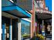 Street view of a local coffee shop with outdoor seating and vibrant storefront at 3324 Springhaven Ave, Atlanta, GA 30354