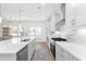 Bright kitchen with a large island, quartz countertops, and stainless steel appliances at 3324 Springhaven Ave, Atlanta, GA 30354