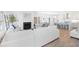 Bright open-plan living room seamlessly connects to the kitchen and dining area creating a welcoming and inclusive atmosphere at 3324 Springhaven Ave, Atlanta, GA 30354