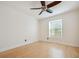 A bright bedroom featuring hardwood floors, a ceiling fan and a window at 1261 Lavista Rd # F-3, Atlanta, GA 30324