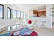 Open living area with a modern decor, breakfast bar and dining area, all with amazing views at 2828 Peachtree Nw Rd # 2002, Atlanta, GA 30305