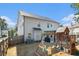 Spacious backyard with a playset and a covered patio area at 2535 Grayton Loop, Villa Rica, GA 30180