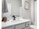 Modern bathroom with a single sink, white countertop, and black fixtures at 2535 Grayton Loop, Villa Rica, GA 30180
