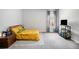 Cozy bedroom with a yellow comforter and a built-in media console at 2535 Grayton Loop, Villa Rica, GA 30180