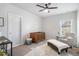 Charming Bedroom with a crib, armchair, and plenty of space for play at 2535 Grayton Loop, Villa Rica, GA 30180