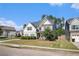 Two-story house with gray siding, stone accents, and a landscaped lawn at 2535 Grayton Loop, Villa Rica, GA 30180