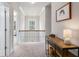 Spacious upper hallway with a wooden railing and a console table at 2535 Grayton Loop, Villa Rica, GA 30180