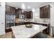 Kitchen island with granite countertop and seating for two at 2535 Grayton Loop, Villa Rica, GA 30180