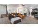 Bright living room with comfortable seating and a view into the kitchen at 2535 Grayton Loop, Villa Rica, GA 30180
