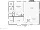 First floor plan featuring primary bedroom, primary bathroom, living room, dining room, laundry, kitchen and entry to garage at 3208 Paddock Rd, Covington, GA 30014