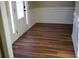 The entryway has hardwood floors, white door and trim, and chair rail molding at 2616 Holden Spring Dr, Dacula, GA 30019