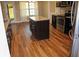 Kitchen featuring hardwood floors, stainless steel appliances, and a center island at 2616 Holden Spring Dr, Dacula, GA 30019