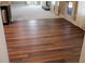 This room has hardwood floors and leads to a living room with a fireplace at 2616 Holden Spring Dr, Dacula, GA 30019