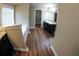 The main bathroom includes wood-look floors and a double sink vanity at 2616 Holden Spring Dr, Dacula, GA 30019