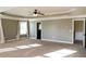 Large main bedroom with tray ceilings, and two doors with one leading to bath at 2616 Holden Spring Dr, Dacula, GA 30019