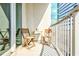 A view of the balcony featuring chairs and a small table, creating a cozy outdoor seating area at 923 Peachtree Ne St # 927, Atlanta, GA 30309