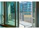 A view to a balcony with glass doors and city views at 923 Peachtree Ne St # 927, Atlanta, GA 30309