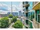 Stunning city view from condo featuring ample balconies and modern architecture on a sunny day at 923 Peachtree Ne St # 927, Atlanta, GA 30309