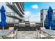 Rooftop grilling area with multiple grills and outdoor seating at 1065 Peachtree Ne St # 3003, Atlanta, GA 30309
