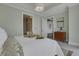 Serene bedroom with soft color palette and access to a hallway at 1065 Peachtree Ne St # 3003, Atlanta, GA 30309