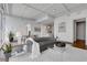 Bright living room with floor-to-ceiling windows, modern decor, hardwood floors, and an open layout at 1065 Peachtree Ne St # 3003, Atlanta, GA 30309